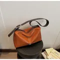 Orange vintage leather tote bag with dark brown adjustable strap and silver metal buckle - One Size / Caramel color