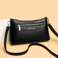 Women's black pebbled leather crossbody bag with silver zippers and elegant metal logo - One Size / Black