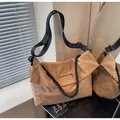Minimalist large khaki tote bag with textured finish and black nylon shoulder strap - One Size / Khaki