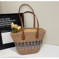 Detail of hand-woven straw tote with blue-purple gradient and brown leather handles - One Size / Khaki