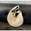 Handcrafted cream crochet shoulder bag with pearl clasp in a half-moon woven design - One Size / White