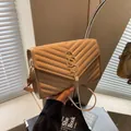 Quilted beige crossbody bag with V-pattern stitching and golden tassel metal logo - Khaki