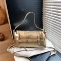 Metallic gold Boston handbag with silver hardware and fashion branding on smooth PU leather - One Size / Gold