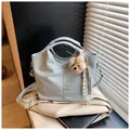 Light blue faux crocodile bucket bag with plush bear charm and detachable strap - With Pendant / Blue