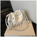 Elegant ivory white butterfly crossbody bag with silver chain strap and drawstring closure - Off White