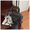 Elegant black leather Boston bag with silver studs and heart pendant decoration - With Pendant / Black