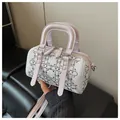 Pink and white Boston bag with studded diamond quilting and adjustable shoulder strap - With Pendant / Purple