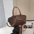 Dunkelbraune Eimer Handtasche aus Leder mit Lychee-Muster und silberner Metallschnalle - Kaffeebraun / Einheitsgröße