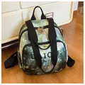 Deep green forest and butterfly print backpack with large front zip pocket - Large / Green