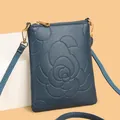 Dark blue leather crossbody phone wallet with embossed rose patterns and gold hardware - Large Blue Rose