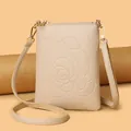 Beige floral embossed vertical phone wallet with gold zipper and pebble leather texture - Apricot Large Rose