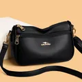 Black litchi grain leather crossbody bag with three zipper layers and gold hardware - One Size / Black