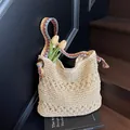 Straw woven tote bag with hollow flower patterns and colorful geometric shoulder strap - One Size / Multicolor Ribbon Beige