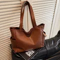 Classic brown large capacity faux leather tote bag with side pockets and smooth texture - One Size / Brown