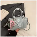 Light blue Boston bag featuring letter embroidery, pink bow, and pearl chain handle - With Pendant / Blue