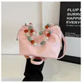 Sac seau rose chic avec poignée en perles colorées et texture cuir grainé - Rose