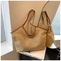 Handwoven straw tote bag in natural beige with long brown leather straps for beach vacation - One Size / Khaki