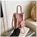Pink lychee texture leather mini crossbody phone bag with a cute dog-shaped charm - One Size / Pink
