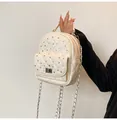 Detail of quilted leather mini backpack with silver turn-lock and chain strap - Off White