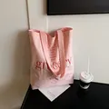 Pink canvas grocery tote bag with green botanical prints and red letter accents - One Size / Pink