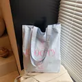 Light blue canvas tote bag with pink grocery lettering and reinforced shoulder strap - One Size / Sky Blue