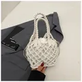 Handmade white woven knit handbag with drawstring inner pouch and minimalist design - Off White