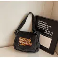 Grand sac cabas en denim gris foncé avec broderie et bandoulière réglable chic - Noir
