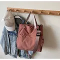 Veelzijdige rode nylon draagtas met schouderband en handig ontwerp met meerdere vakken - Oudroze