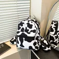 Fashionable cow print backpack with large capacity and adjustable straps in casual setting - Cow Print