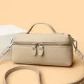 Elegant beige lychee grain square handbag with top handle and silver zipper detail - Apricot