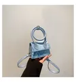 Mini-Tasche mit blauem Schlangenmuster, großem Rundgriff und schmalem Schultergurt - Blau