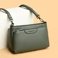 Retro dark green leather crossbody bag with front zipper pocket and slim shoulder strap - One Size / Tea Green