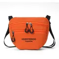 Bright orange nylon crossbody bag with multi-zipper compartments and black straps - Orange