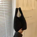 Chic black rhinestone bucket bag with sparkling crystals and silver chain strap - Black