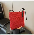 Close-up of red hollow crochet texture and black leather strap on a stylish tote bag - With Pendant / Red