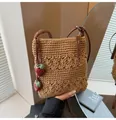 Handmade woven crossbody bag in caramel brown featuring 3D strawberry charms and zip closure - With Pendant / Khaki