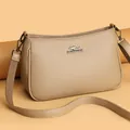 Elegante aprikosenfarbene Umhängetasche aus Leder mit hochwertigem Lychee-Muster - Hellbeige
