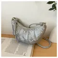 Chic silver croissant shoulder bag with scale texture and knotted strap detail - Gray