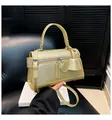Elegante champagner-goldene Lederhandtasche mit Doppelreißverschluss und Schultergurt - Gold