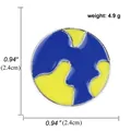 Badge émaillé puzzle carte du monde bleu et jaune avec dimensions et affichage du poids - A00206.