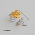 Macro detail of two-tone floral ring showing 14.5mm golden flower and 4.3g weight - Gold Five-Petal Flower Style (252)