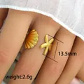 Anillo abierto de acero inoxidable dorado con estrella de mar y concha en el dedo - Estilo Caracol de Mar Concha Estrella de Mar (23)