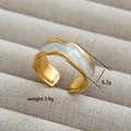 Detail of golden wavy open ring with white marble inlay weighing 3.9g and 8.2mm wide - Scalloped Marble Slice Style (239) / Gold/White