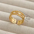 Macro detail of a 7.3mm gold-plated stainless steel ring with a rope texture - Rhombus Rope Texture Style (246) / Gold/White