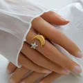 Detail view of gold moon and silver star ornaments on an adjustable open ring band - Star Moon Open Design (283)