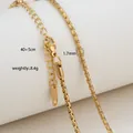 Detailed view of 1.7mm gold box chain necklace with S.Steel stamp and lobster clasp - Polished Box Chain Style / Gold