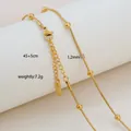 Detail of 18K gold plated stainless steel snake chain with small round beads and lobster clasp - Snake Chain with Spaced Beads Style / Gold