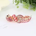 Golden peacock hair clip with pink rhinestones and red teardrop crystals - Peacock Red