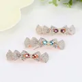 Sparkling crystal bow hair clip with colorful rhinestones in purple and blue - Red Bowknot
