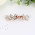 Elegant rose gold bow hair clip with sparkling crystals and amber gemstones - Champagne Bowknot